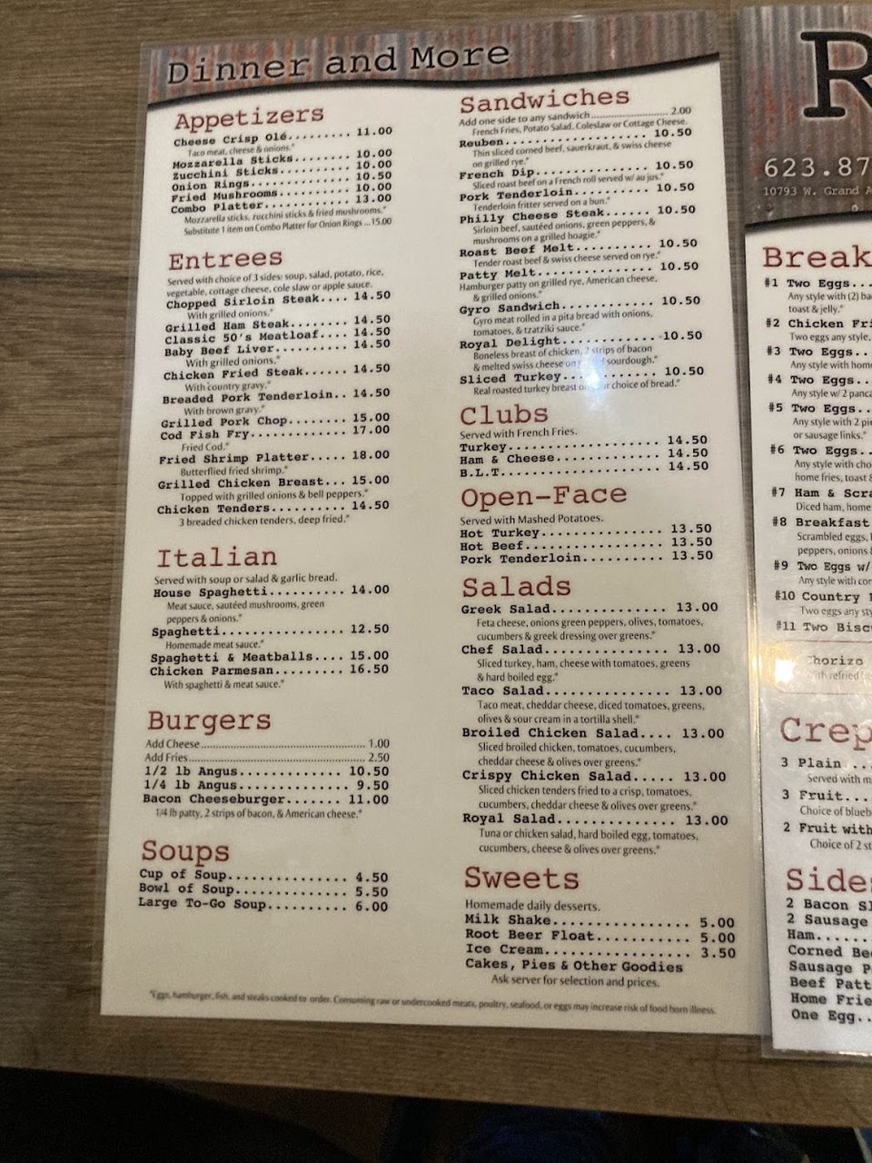 Menu page with breakfast plates and sandwiches.